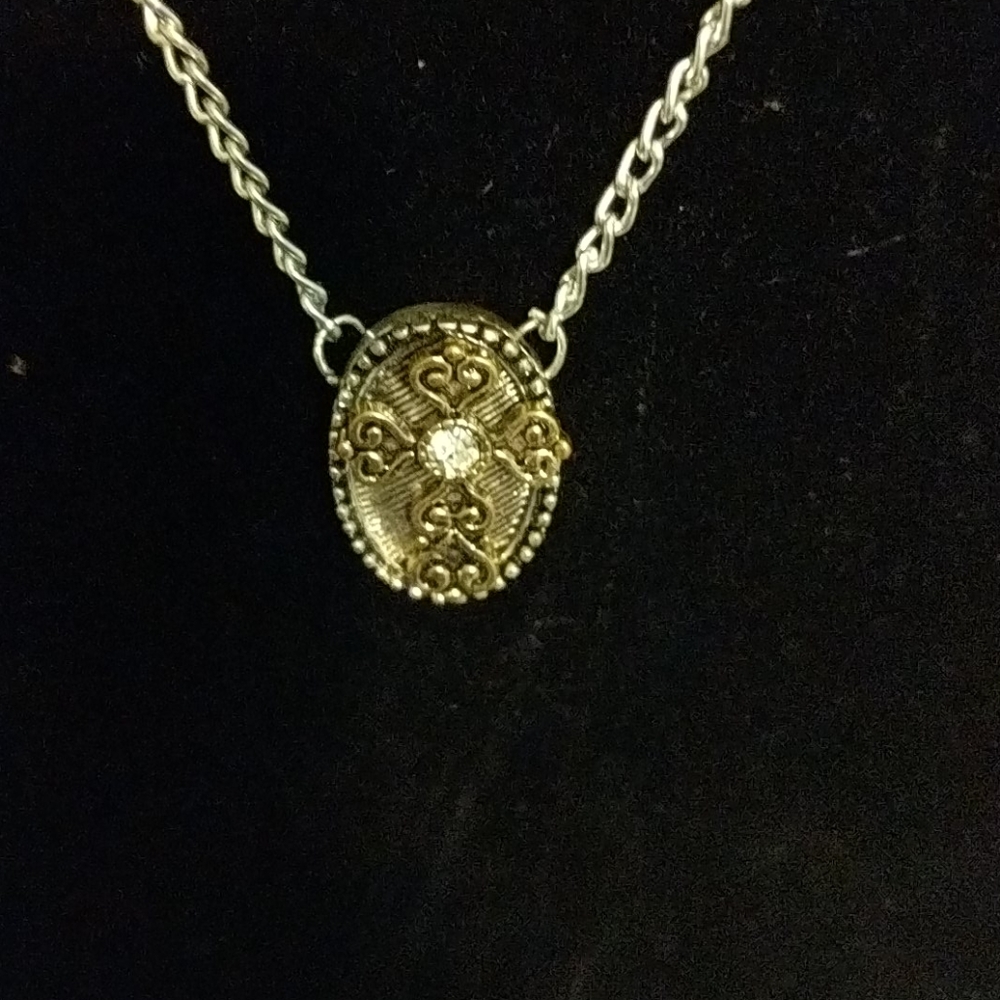 Delicate cross in silver and gold setting 18 inch